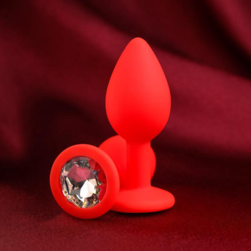 Красная анальная пробка с прозрачным кристаллом - 7,2 см. - 0
