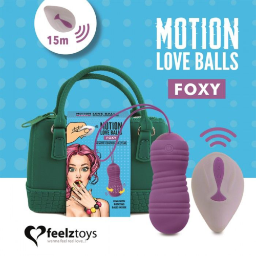 Фиолетовые вагинальные шарики с вращением бусин Remote Controlled Motion Love Balls Foxy - 3