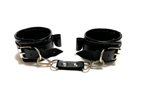 Черные наручники с бантиками из эко-кожи - 1
