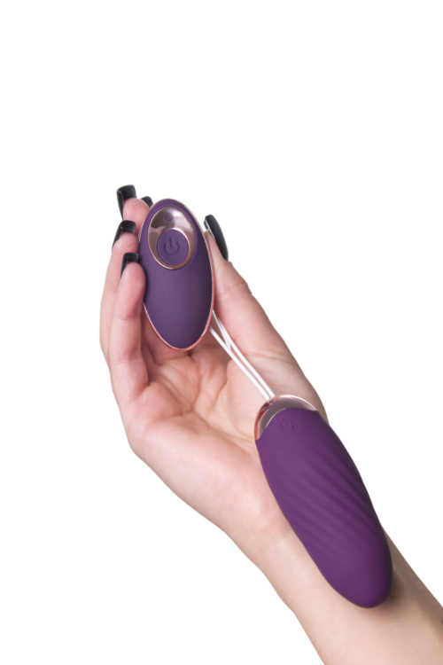 Фиолетовое виброяйцо с имитацией фрикций Bumpy - 5