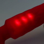 Красный жезловый вибромассажер с рифленой ручкой - 20,4 см. - 1