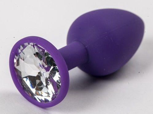 Фиолетовая силиконовая анальная пробка с прозрачным стразом - 7,1 см. - 0