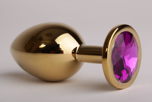 Золотистая анальная пробка с фиолетовым кристаллом - 9,5 см. - 0