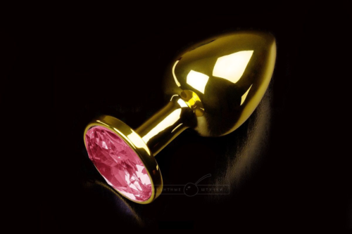 Маленькая золотистая анальная пробка с круглым кончиком и рубиновым кристаллом - 7 см. - 0