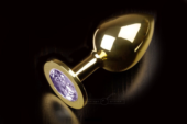 Большая золотая анальная пробка с закругленным кончиком и сиреневым кристаллом - 9 см. - 0