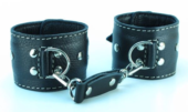 Чёрные кожаные наручники с крупной строчкой - 0