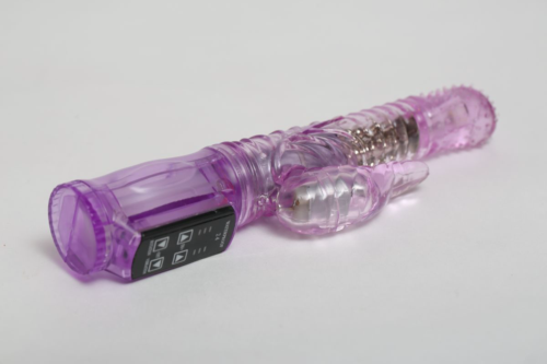Фиолетовый силиконовый вибратор с подвижной головкой в пупырышках - 21 см. - 1